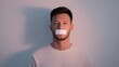 © AMK  - Young man with a strip of tape over his mouth, standing against a soft gradient background, symbolizing silence and communication barriers in a modern context