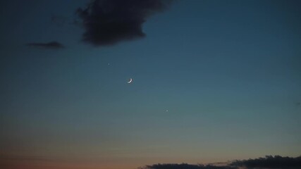 Wall Mural - crescent young moon with stars, planets and some clouds.