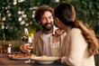 © bnenin - Happy Couple Enjoying Romantic Dinner with Wine and Delicious Italian Cuisine