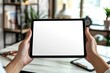 © Mutmainah - Vibrant Picture of Businesswomans Hand Holding Digital Tablet in Hand Over the Desk