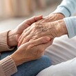 © Suman Acharja - close up of a senior couple holding hands