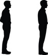 © Lotus - Silhouettes of two men standing and facing each other in conversation, representing communication, discussion, or social interaction concept