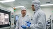 © Iurii - Scientists discuss research processes in a clean room laboratory environment