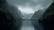 © rashedhossain - Moody mountain fjord with dark water and misty peaks mountains lake