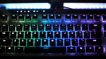Rgb Mechanical Keyboard Displaying Vibrant Rainbow Backlighting For Gamers