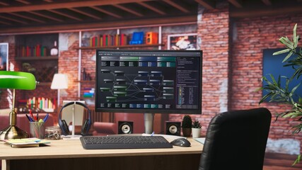 Programming software UI on computer monitor in apartment office. Machine learning application on PC screen used to write and test code in modern apartment, handheld camera shot