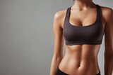 Trim female form in grey studio results of fitness and healthy eating Idea of beauty body care and wellness