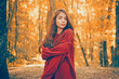 © Volodymyr - Woman with autumn leaves of maple trees. Woman near autumn fall leaves in sunlight. Natural beauty girl on autumnal fall background. Foliage, falling leaves background, autumn leaf and people concept.