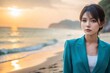 © YK - 砂浜を歩くキャリア女性