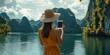 © Soklin - holiday, sun, dress, traveler in a scenic location video chatting with family back home