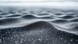© arsyi_06 - Wavy, textured surface covered in subtle silver sparkles in shallow depth of field
