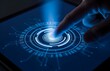 © shovons_gellary - Finger touching a glowing blue digital interface with futuristic technology
