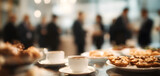 A networking coffee break at a corporate event, participants mingling with blurred focus on elegant pastries and coffee cups.