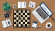 © Victuscon - Top-down view of modern workspace with chessboard, laptop showing graphs, smartphone, coffee, and notepad, symbolizing strategy and focus