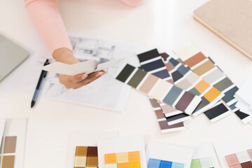 Wall Mural - Creative web designer planning UI application and developing digital template