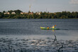 © standret - Sportive father is with his young son is swimming in the kayak
