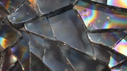 Wall Mural - Iridescent Glass Fragments Close Up Detailed Texture Background Shimmering Rainbow Colors Shattered Pieces Reflective Surface Geometric Pattern Dark