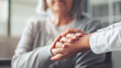 © sebra - Hands holding old woman's hands