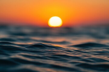 Wall Mural - a serene sunset over the waves