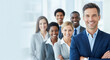 © Kamran - A confident businessman in a blue shirt and suit leads his diverse and smiling team in a portrait. Perfect for illustrating strong and positive leadership
