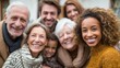 © Johannes - group of multigenerational people smiling in front of camera  multiracial friends of different ages having fun together  main focus on caucasian senior faces no logos no brands ar 169