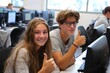 © zen - Two students smiling with satisfaction after finishing a project