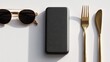 © 8 - Flat lay gold sunglasses, black power bank, gold cutlery on white
