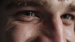 © Ammad - The intense gaze of a person enduring physical exertion marked by sweat and determination captured in extreme close up