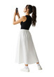 © Image Creative Stock - Back view of Woman standing and taking photo by phone isolated on white or transparent background
