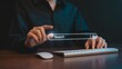 © BEST - Person using virtual search bar with keyboard and mouse on wooden table