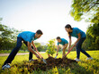 © alfredo - Volunteers planting a young tree, symbolizing growth and community, a family works together for a greener future, fostering hope and sustainability.