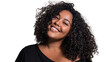 © CStock - Smiling woman with curly hair, showcasing confidence and joy against a neutral backdrop.