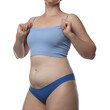 © New Africa - Liposuction. Woman in underwear on white background