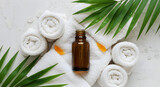 Elevated spa experience: a tranquil arrangement featuring a tincture bottle, fresh towels, botanical accent and delicate floral details creating a refreshing zen ambiance ideal for wellness