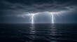 © Hamid - Two powerful lightning bolts strike the dark ocean during a dramatic night storm.