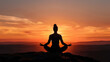 © buraratn - Meditation practice at sunset, showcasing serene figure in lotus position against vibrant sky. peaceful atmosphere evokes tranquility and mindfulness