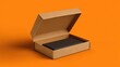© laode - Open cardboard box with a black rectangle inside, on an orange background