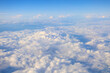 © Rimma - Clouds in the sky under the wing of an airplane