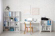 © Pixel-Shot - Stylish workplace with modern printer and laptop in light home office