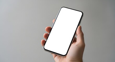 A Clean, Modern Smartphone Mockup Held Firmly in Hand Against a Soft Gray Backdrop