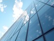 © Coffee_Reflections - Glass skyscraper reflects endless blue sky