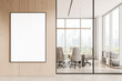 © ImageFlow - Blank framed poster mockup on wooden wall in modern office interior with glass meeting room and cityscape view through large windows in daylight setting. 3D Rendering