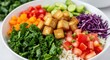 © Tika - Colorful Vegan Salad Bowl with Fresh Vegetables and Crispy Tofu Cubes