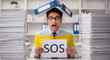 © Muhammad - Overwhelmed businessman SOS help needed office stress deadline pressure paperwork chaos emergency rescue help urgent need assistance business crisis overwhelmed employee