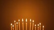 © pngking - Golden Candles for Birthday Celebration on a Brown Background with Copy Area