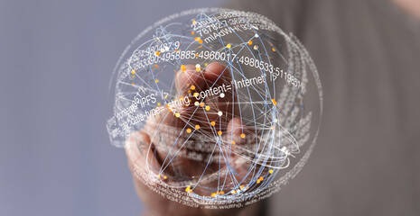 Hand interacts with a digital sphere showing internet data and connections.