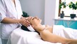 © Bobi - Serene Facial Massage: Gentle Hands, Tranquil Spa Setting
