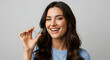 © Sulfabndi - Confident woman smiling showing clear aligners for straight teeth perfect smile dental care teeth whitening oral hygiene healthy teeth beautiful smile orthodontic treatment