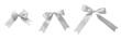 © Chinnapong - Silver bow ribbon band satin grey stripe fabric ( PNG isolated on transparent background) for Christmas holiday gift box, greeting card banner, present wrap design decoration ornament