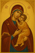 © Bodrea - Traditional byzantine orthodox icon of Virgin Mary Tenderly holding infant Jesus with golden background